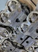 Metal chain clip components after disassembly