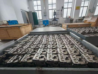 Chain and clip components arranged for processing